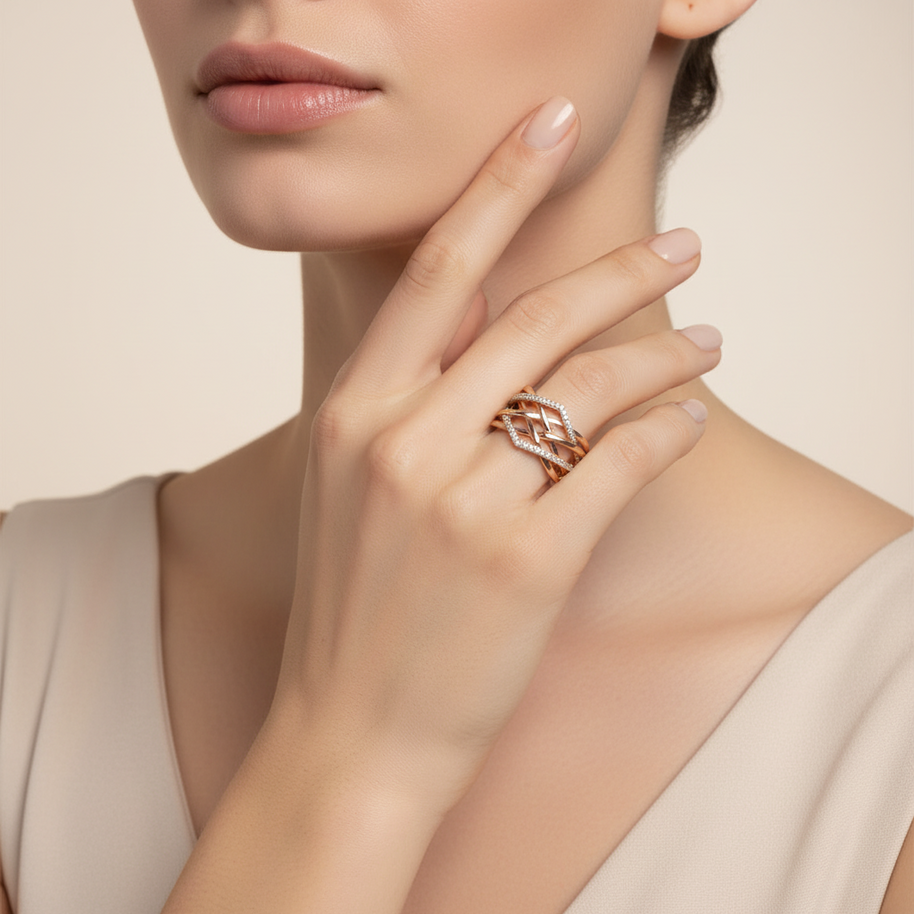 Женское кольцо X-Ring с фианитами из красного золота 585 пробы