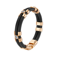 Kautschuk-Armband mit Goldelementen und Zirkonia