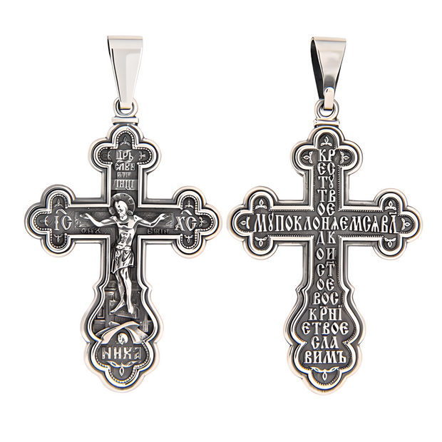 Подвеска в виде православного креста из серебра 925 пробы.