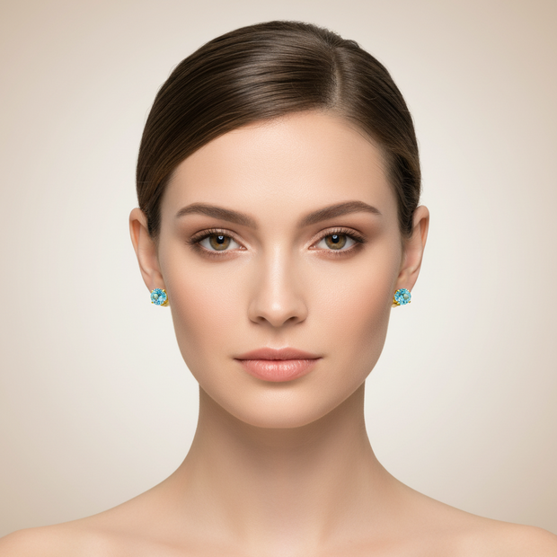 Ohrstecker aus Gelbgold 333 mit hellblauem Zirkonia