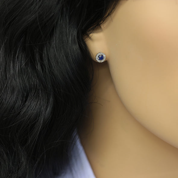 Ohrstecker mit Saphire und Diamanten. Weißgold 585