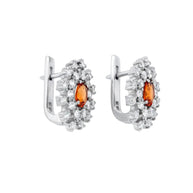 Earrings made of 925 sterling silver with garnet.
