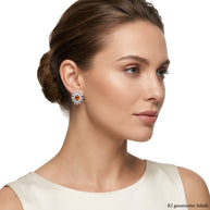 Earrings made of 925 sterling silver with garnet.